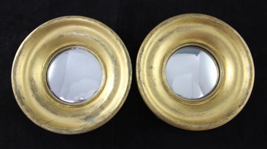 A pair of Victorian convex glass wall mirrors, Diam. 9in.
